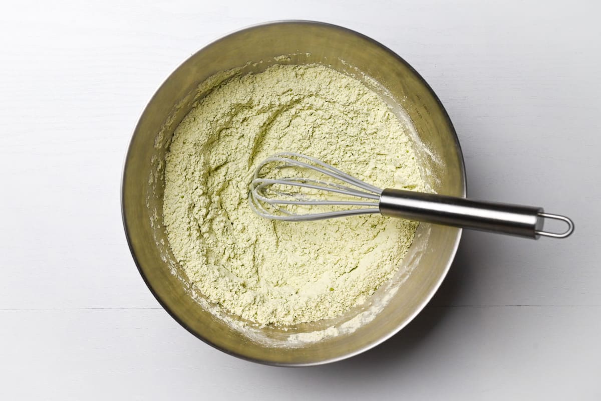 Matcha muffins dry ingredients thoroughly mixed in a mixing bowl