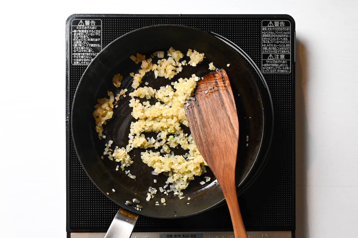 softened onions in a frying pan