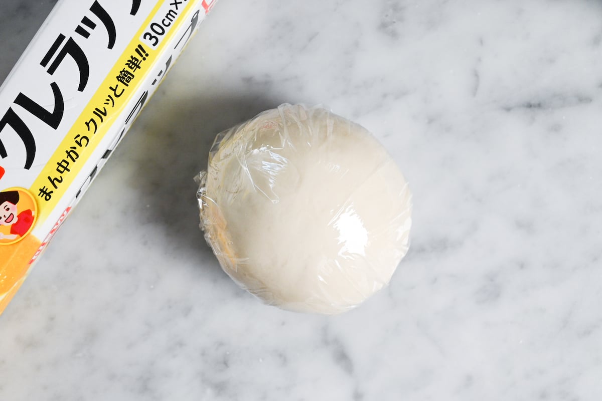 gyoza wrapper dough wrapped with plastic wrap