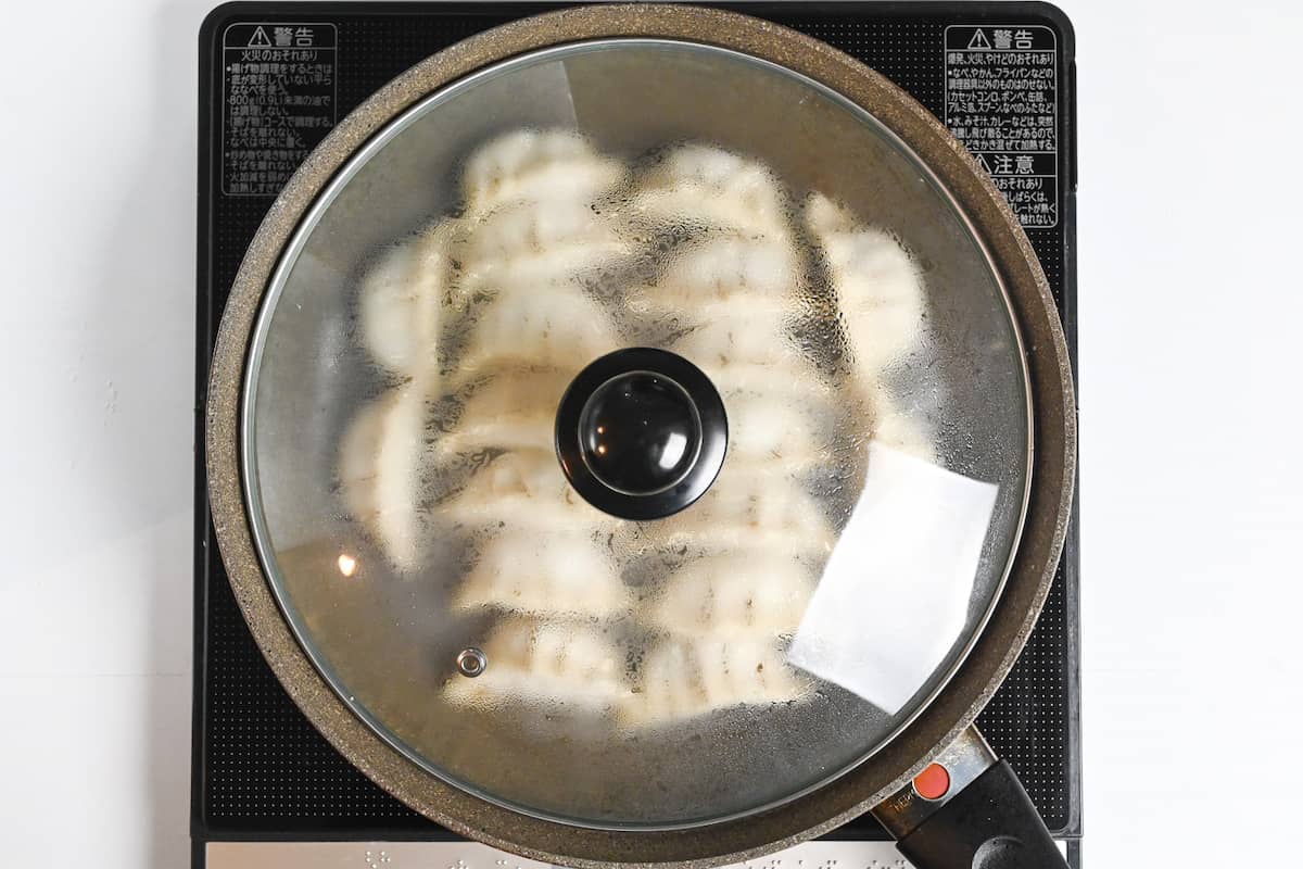 steaming the gyoza with the lid on