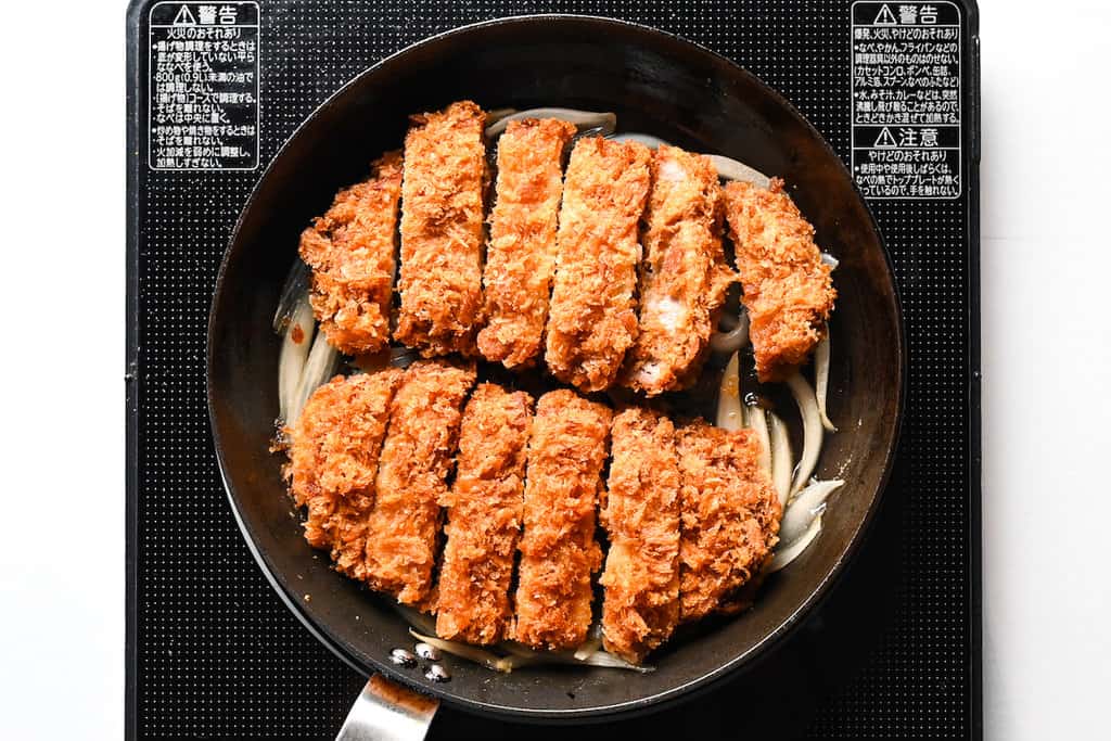 placing katsu into pan