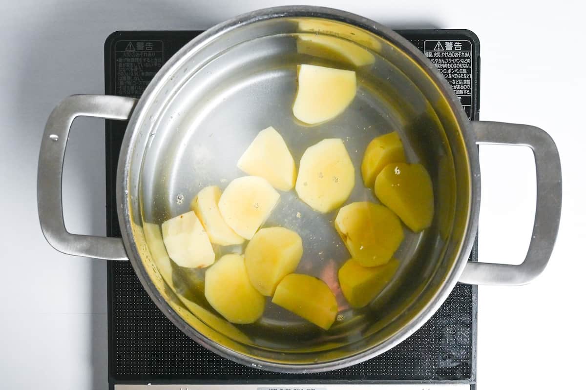 potatoes in a pot of water