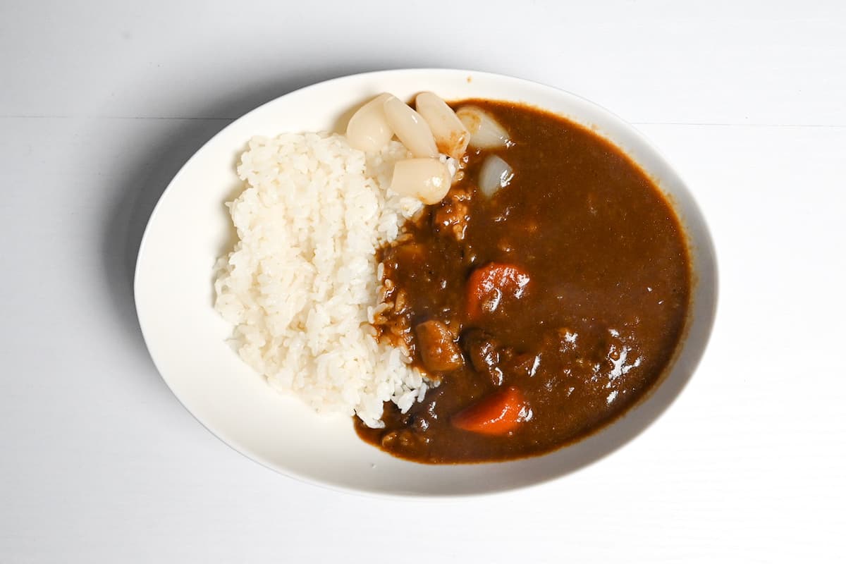 Curry rice topped with rakkyozuke (pickled Chinese onion)