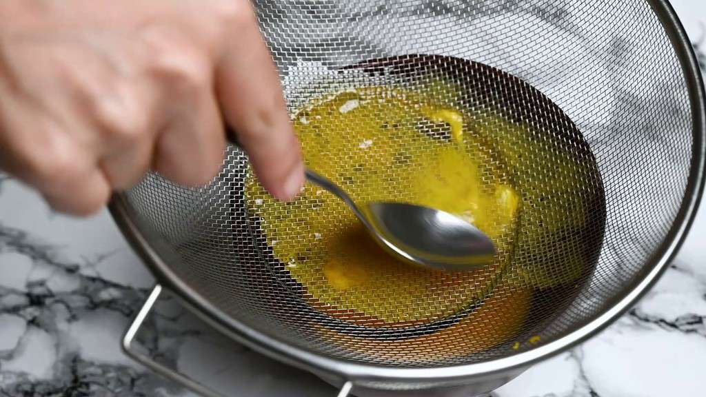 Passing egg through sieve