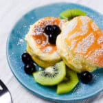 Fluffy Japanese Soufflé Pancakes with kiwi and blueberries