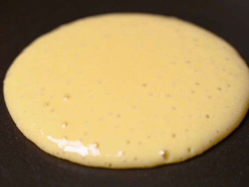 Making dorayaki: bubbles forming on the top of the pancake