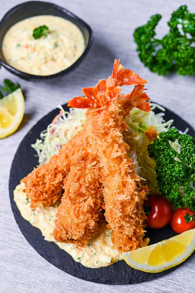 Ebi Fry (Japanese fried shrimp) served with tartar sauce, salad and lemon wedges