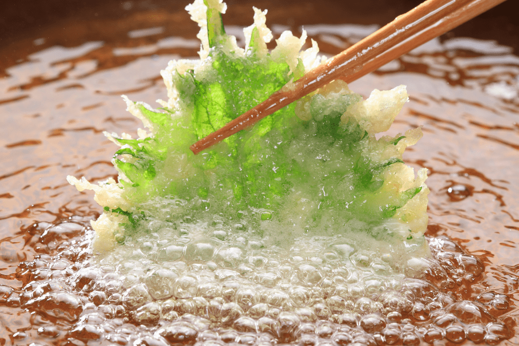 frying shiso leaf with tempura batter