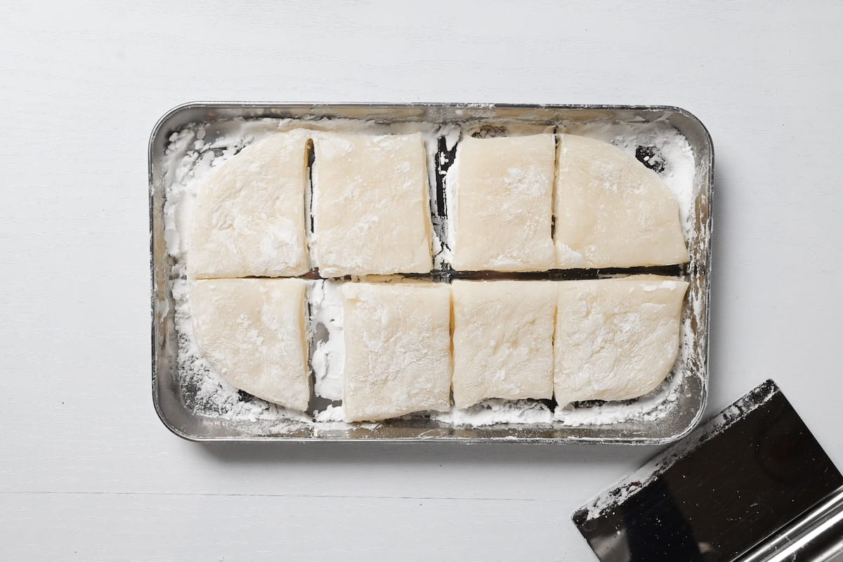 mochi dough rolled out and cut into eight