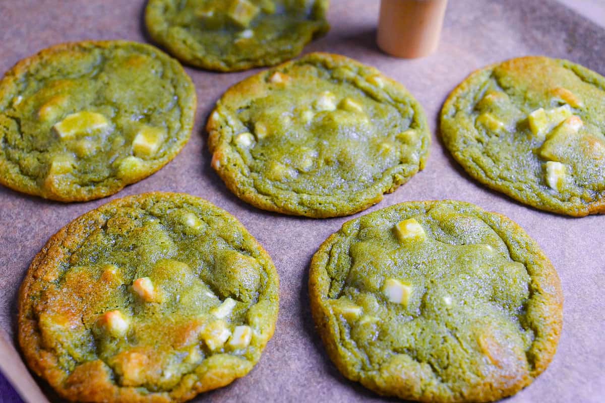 matcha green tea and white chocolate cookies on a baking sheet