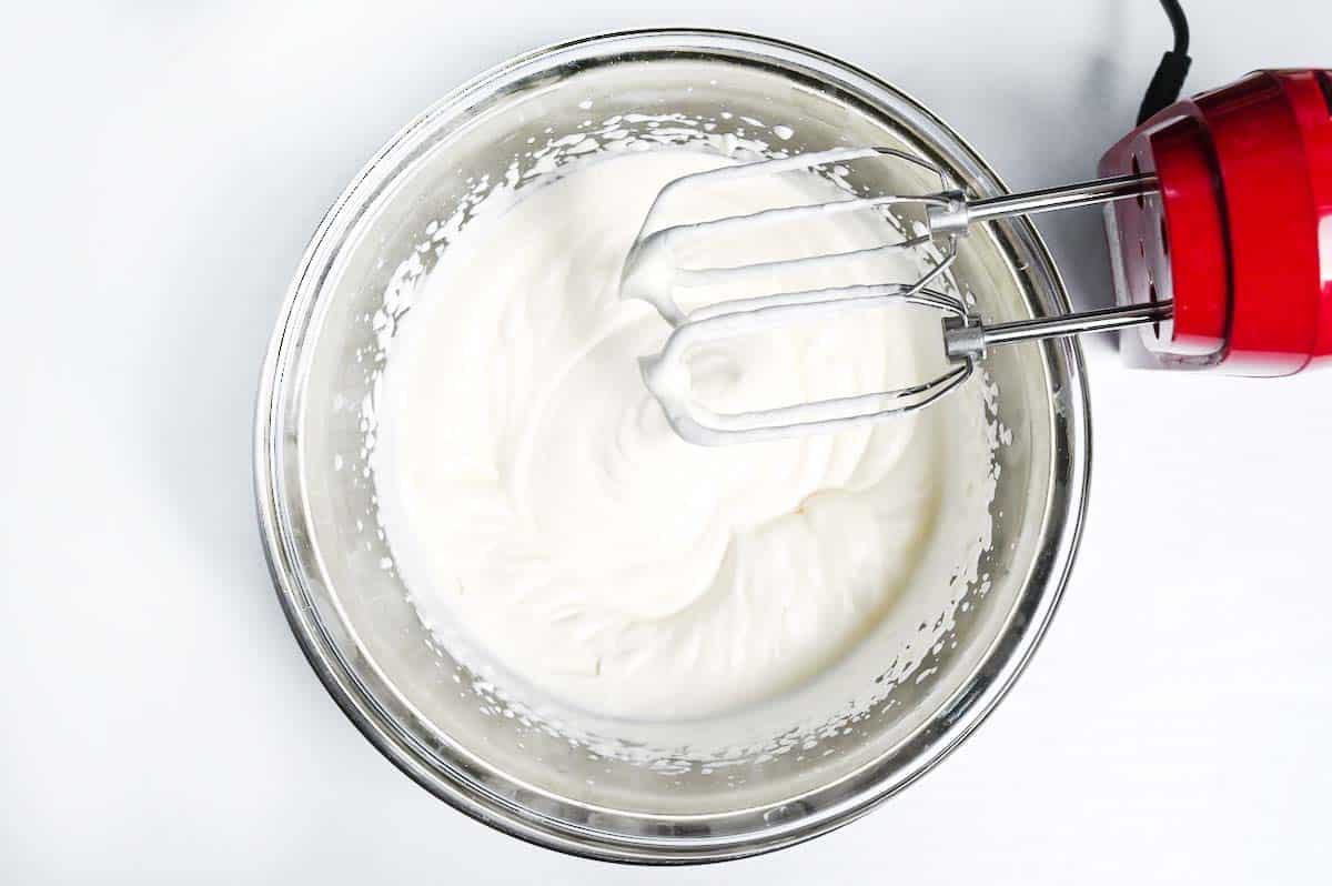 Whipped cream in a glass bowl