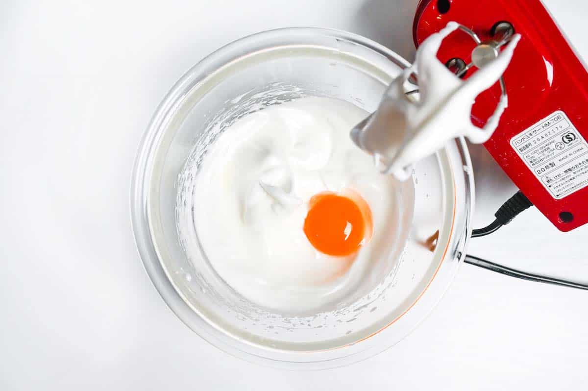 Adding yolks to meringue