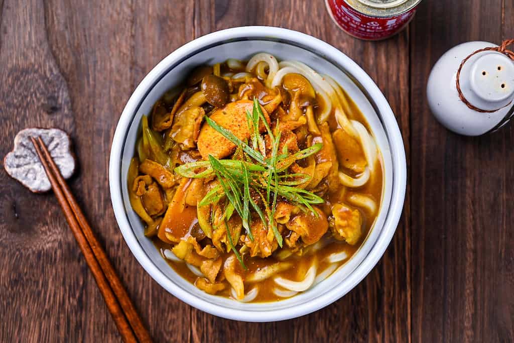 Japanese curry udon topped with chopped spring onions