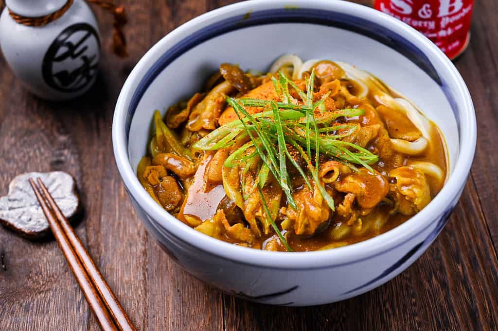 Japanese curry udon topped with chopped spring onions