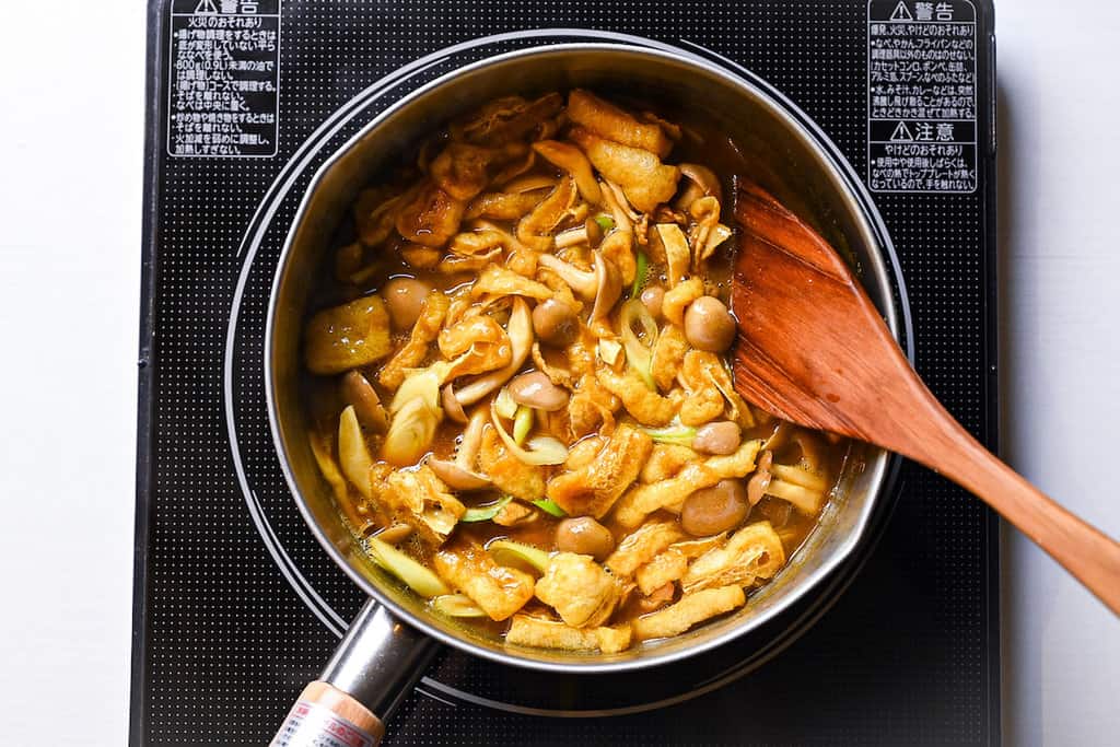 Mixing the ingredients into the broth