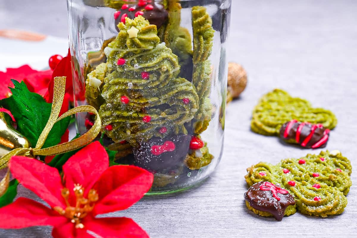 Matcha green tea christmas cookies in a glass jar