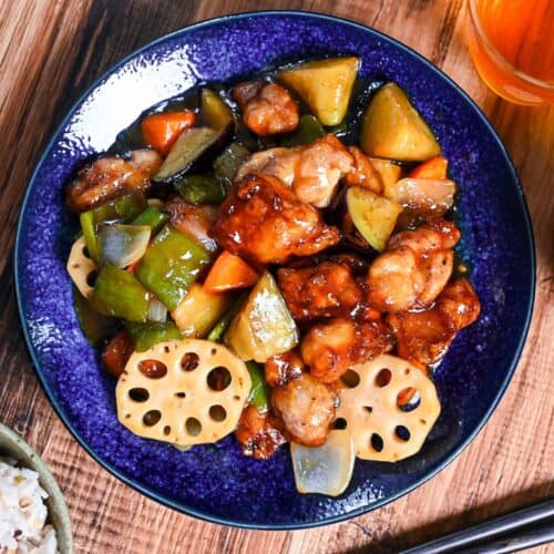 Japanese black vinegar chicken and vegetables (Ootoya style tori to yasai no kurozu an) on a blue plate