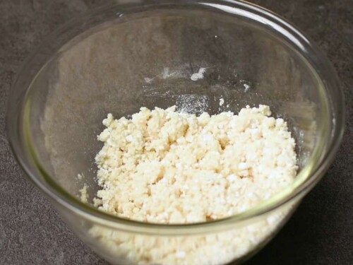 mixing the tofu into hanami dango mixture until the texture resembles scrambled eggs