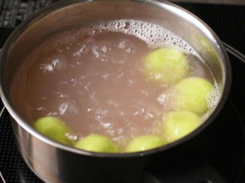 Green dango floating in the pot