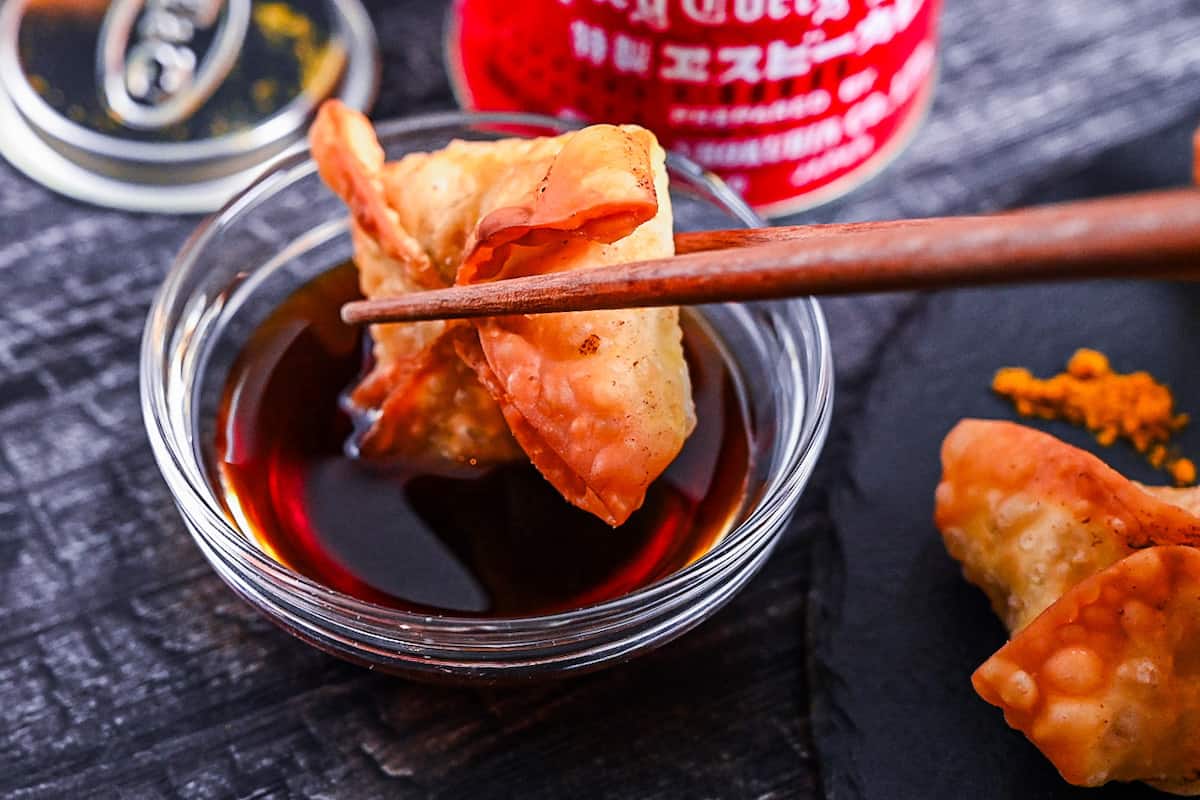 dipping curry flavor age-gyoza in homemade ponzu