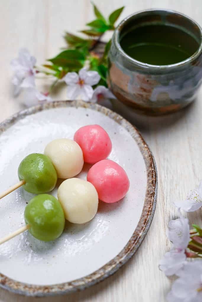 hanami dango with cherry blossoms and green tea