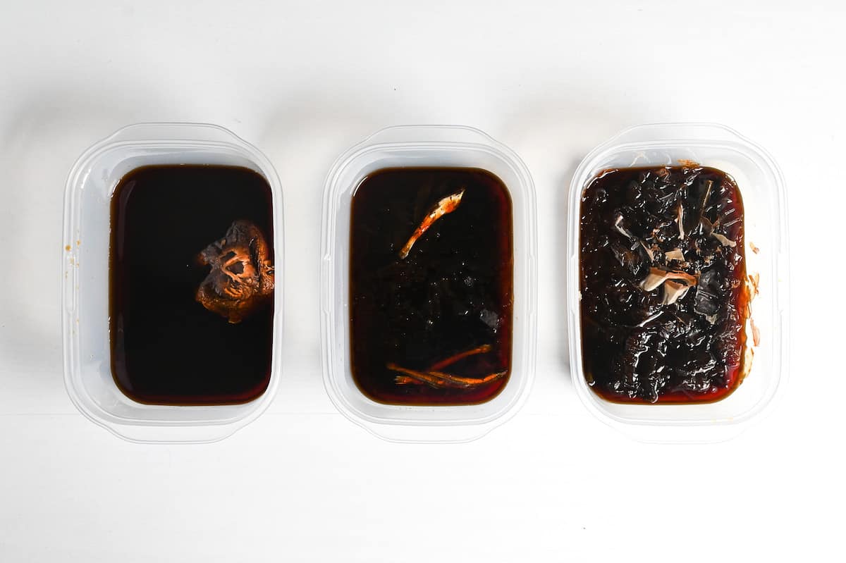 tsuyu sauce made with three types of dashi ingredients (left to right) shiitake, niboshi (dried sardines), katsuobushi and kombu (bonito flakes and dried kelp)