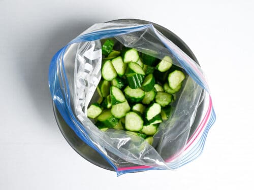 Roughly chopped Japanese cucumber in a large ziplock bag