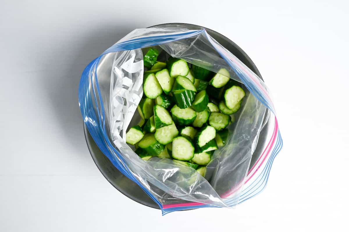 Roughly chopped Japanese cucumber in a large ziplock bag