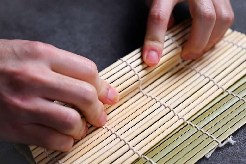 rolling kappa maki using a bamboo rolling mat