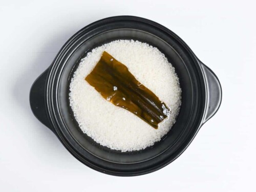 kombu and rice soaking in a pot