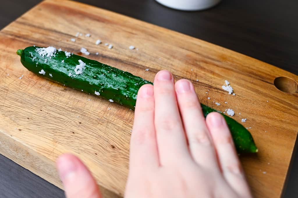rolling cucumber in salt