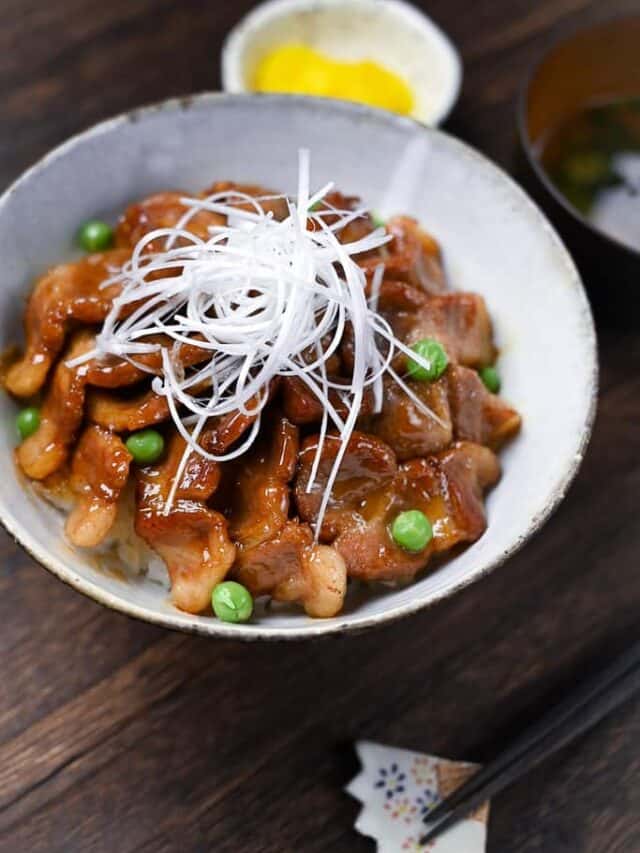 Butadon pork rice bowl served with takuan pickles and miso soup