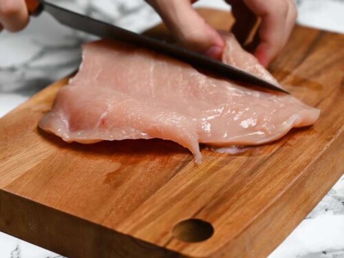 Cutting the other side of the chicken breast
