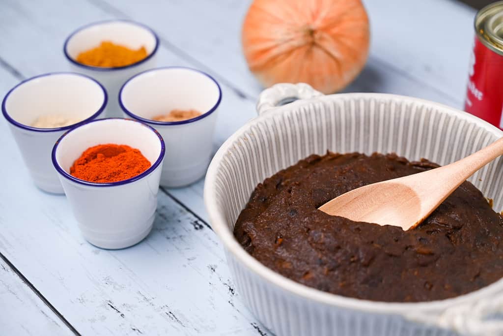 Homemade Japanese curry roux paste in a white dish with spices