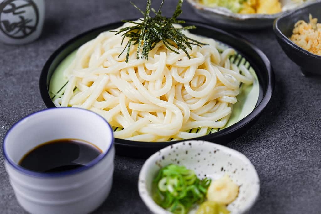 Zaru udon served with mentsuyu and tempura side view