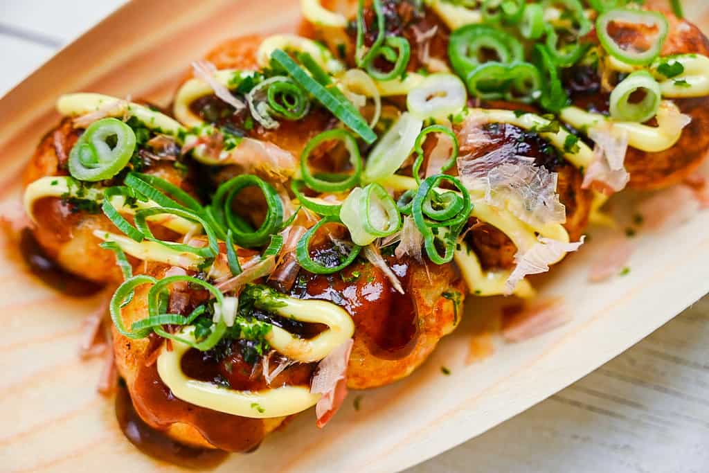Takoyaki in a bamboo boat container diagonal view