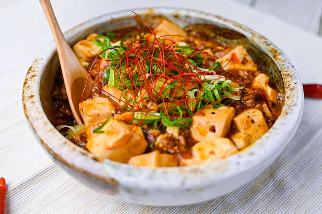 Japanese mabo tofu with wooden spoon