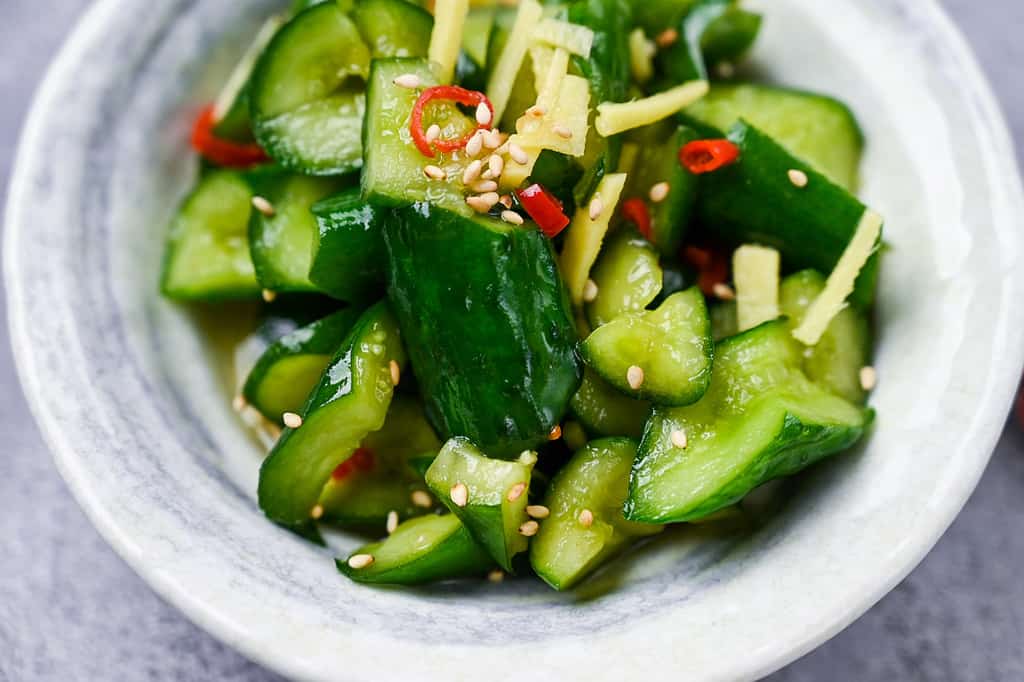 Japanese pickled cucumbers with ginger and chili close up