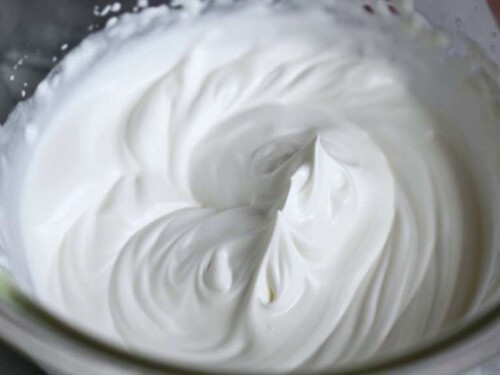 Whipped cream with stiff peaks