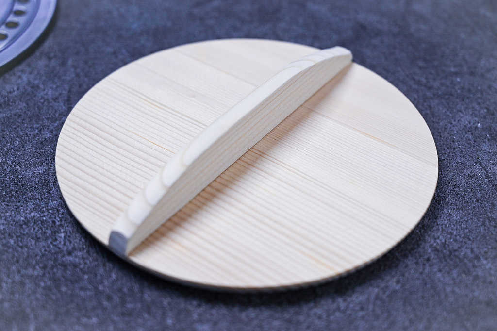 wooden otoshibuta drop lid on grey surface