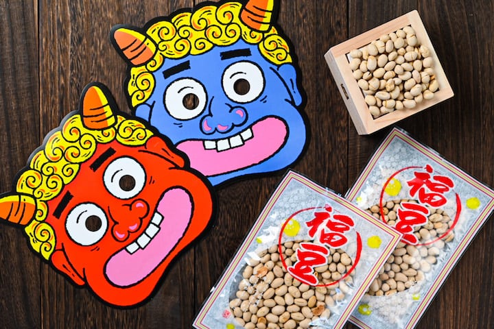 Red and blue oni masks for setsubun with lucky beans