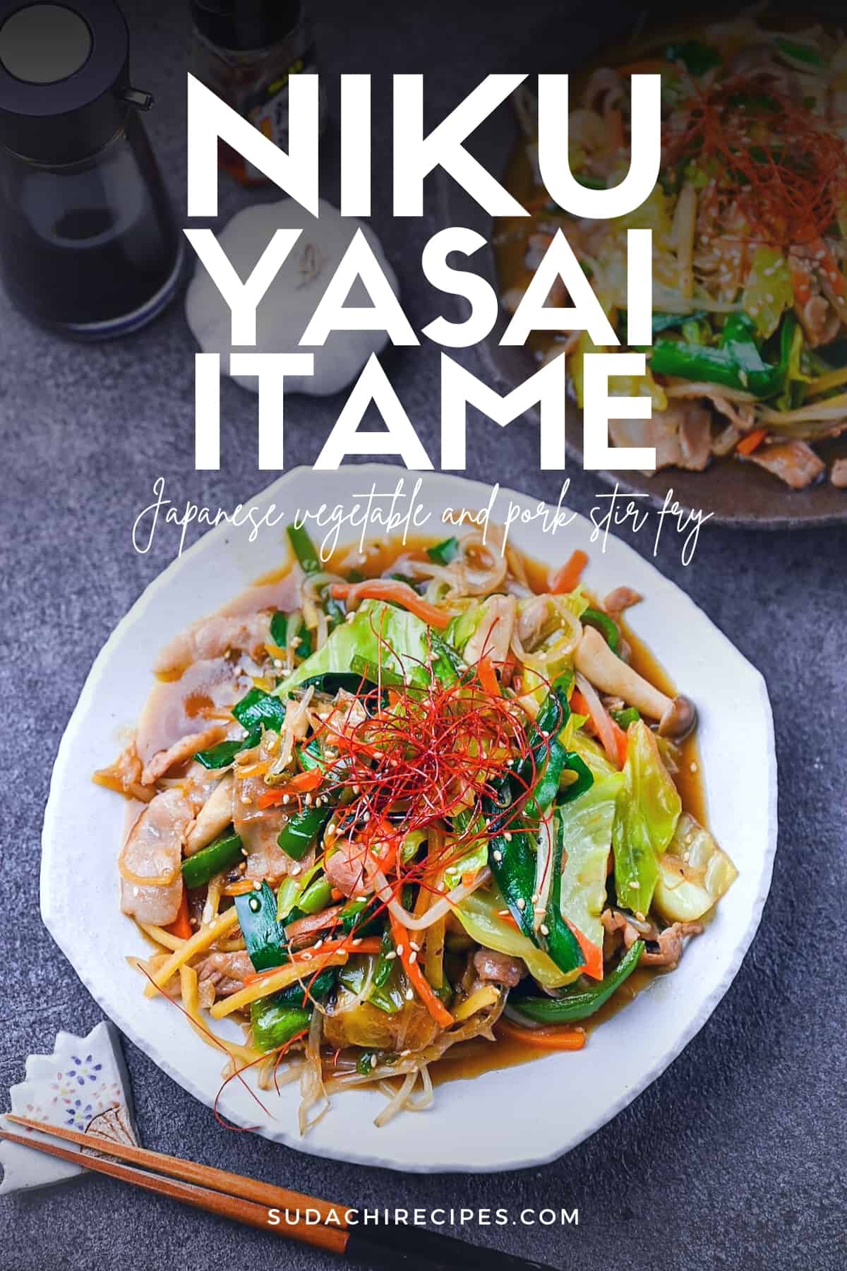 Niku Yasai Itame served on a white plate and topped with chili threads (Japanese style vegetable stir fry with pork)