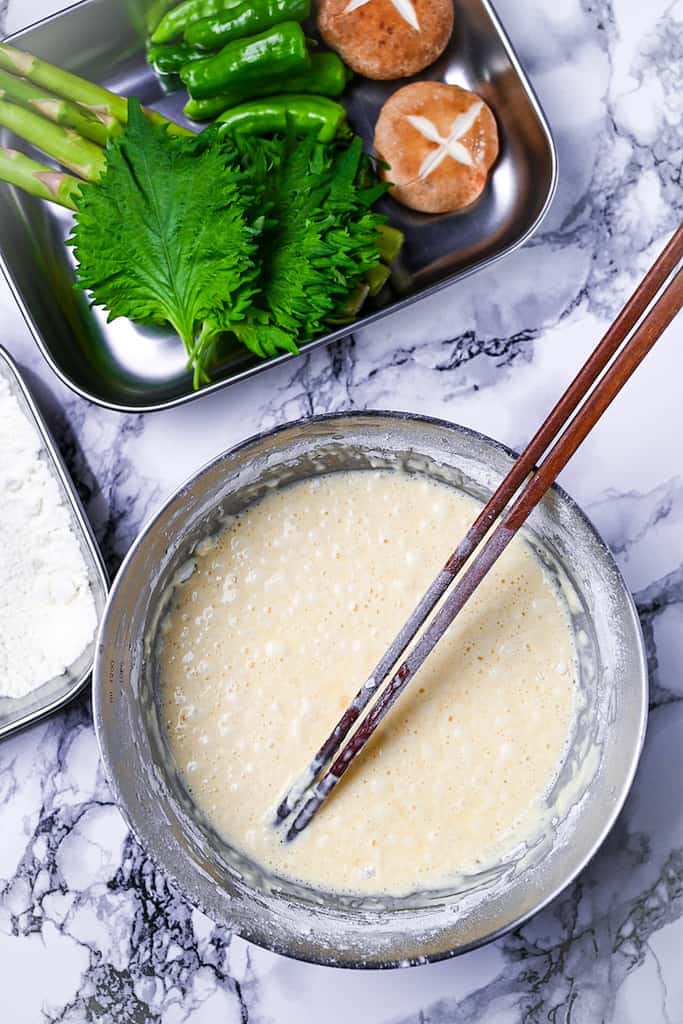 Tempura batter in a steel mixing bowl