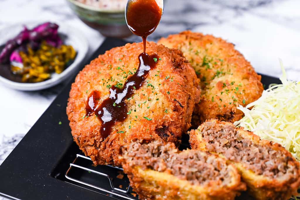 Menchi Katsu Japanese ground meat cutlet drizzled with homemade sauce