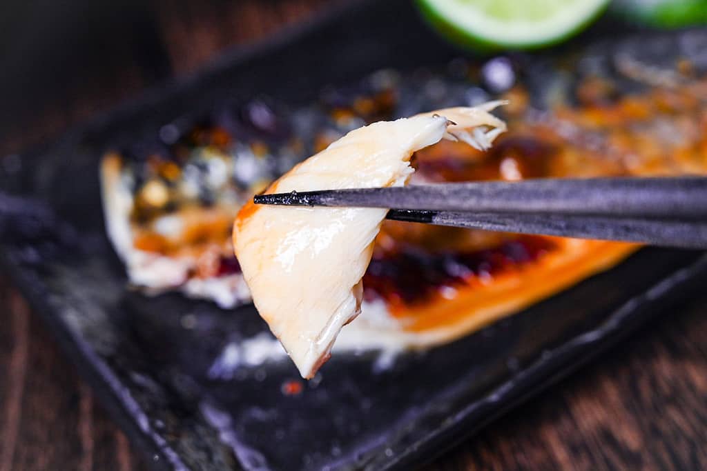 Japanese grilled mackerel (saba no shioyaki) served with oroshi daikon, sudachi, rice, miso soup and pickles