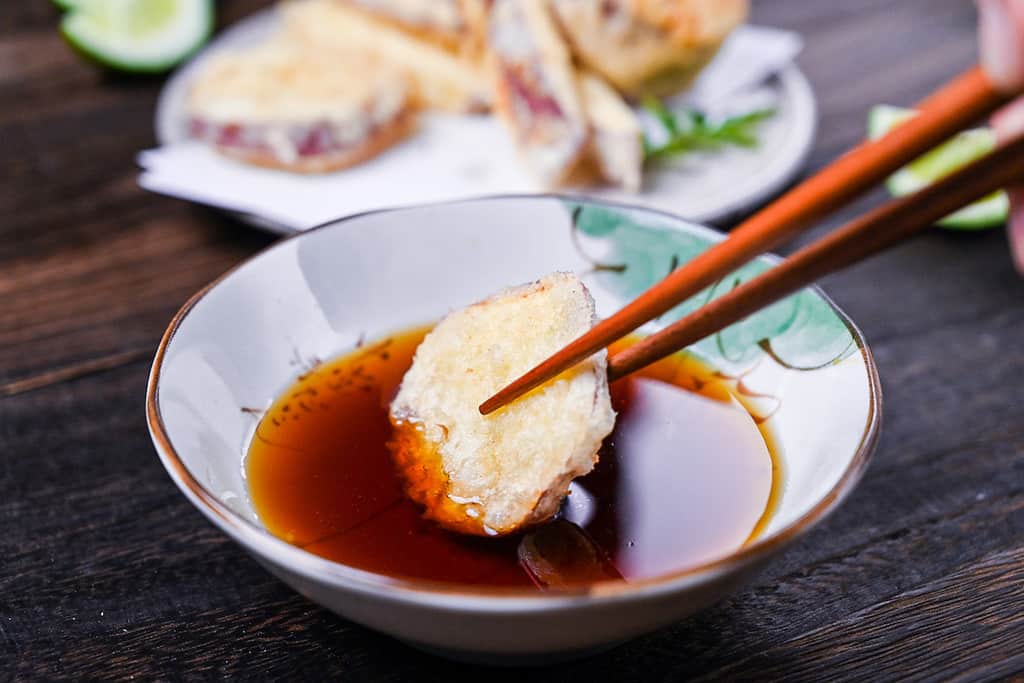 Japanese sweet potato tempura dipped in tentsuyu dipping sauce