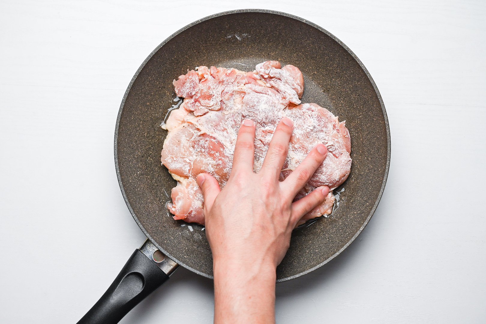 fry chicken thigh in the pan