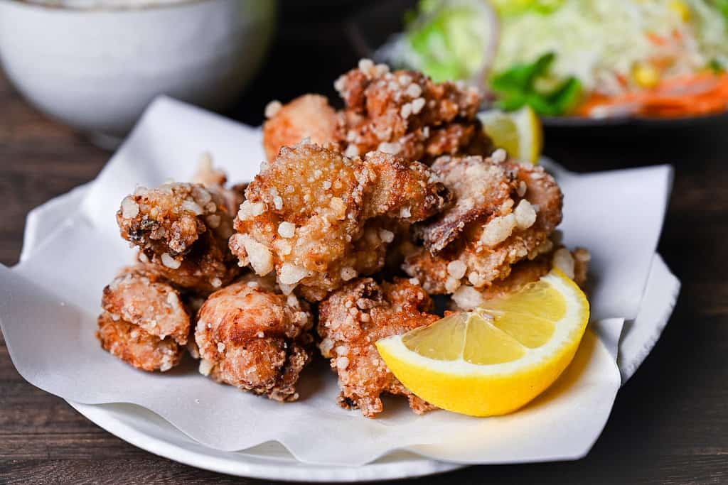 Authentic Japanese chicken karaage served with a slice of lemon