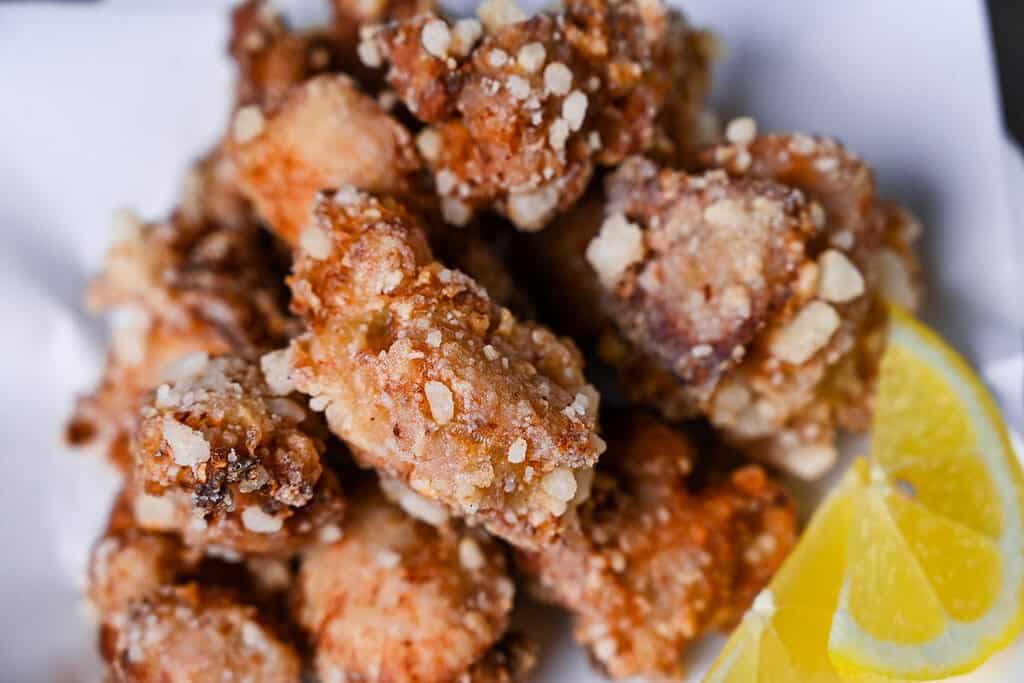 Authentic Japanese chicken karaage served with a slice of lemon