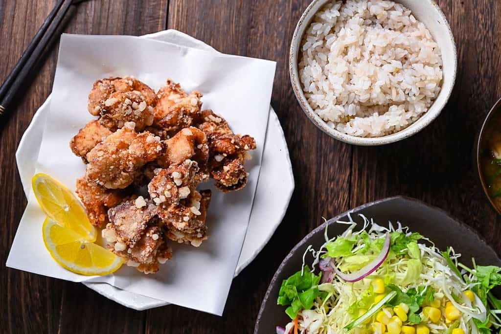 Authentic Japanese chicken karaage served with a slice of lemon